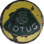 Green and yellow badge, rather battered
